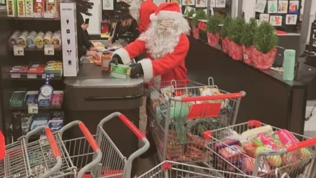 Gang of Santa's Rob Grocery Stores to Give Food to the Needy