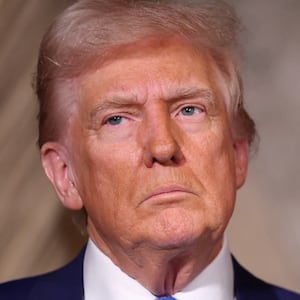 U.S. President Donald Trump looks on at Mar-a-Lago in Palm Beach, Florida, U.S., February 18, 2025. REUTERS/Kevin Lamarque