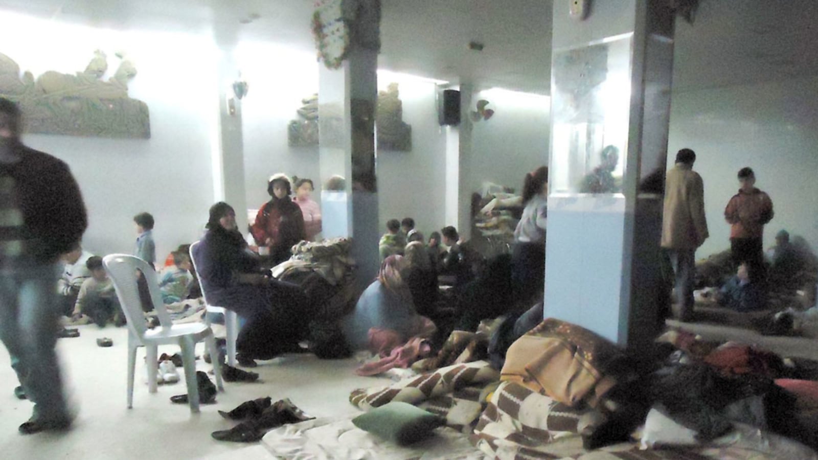 articles/2012/02/23/rebels-and-ordinary-citizens-alike-struggle-to-survive-the-bombing-of-homs/syria-neighborhood-paul-riziq_snddhe