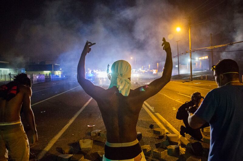 articles/2014/08/18/you-can-buy-body-cameras-for-ferguson-p-d/140818-missouri-riots-8_utfghf