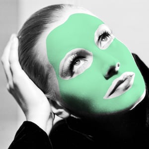 Greta Garbo with a green face mask