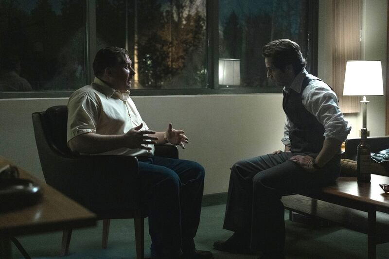 Michael Chernus as John Wayne Gacy and Michael Angarano as Sam Amirante.