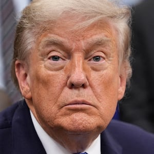 U.S. President Donald Trump looks on as he sits in the Oval Office of the White House in Washington, D.C., U.S., June 26, 2026. REUTERS/Ken Cedeno