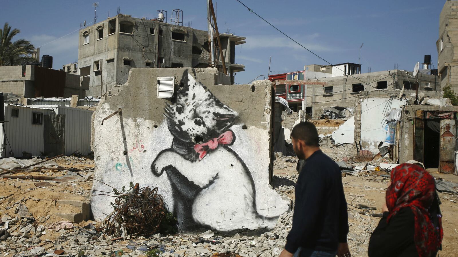 cheats/2015/04/01/gaza-man-tricked-into-banksy-mural-sale/150401-gaza-banksy-cheat_k9gldb