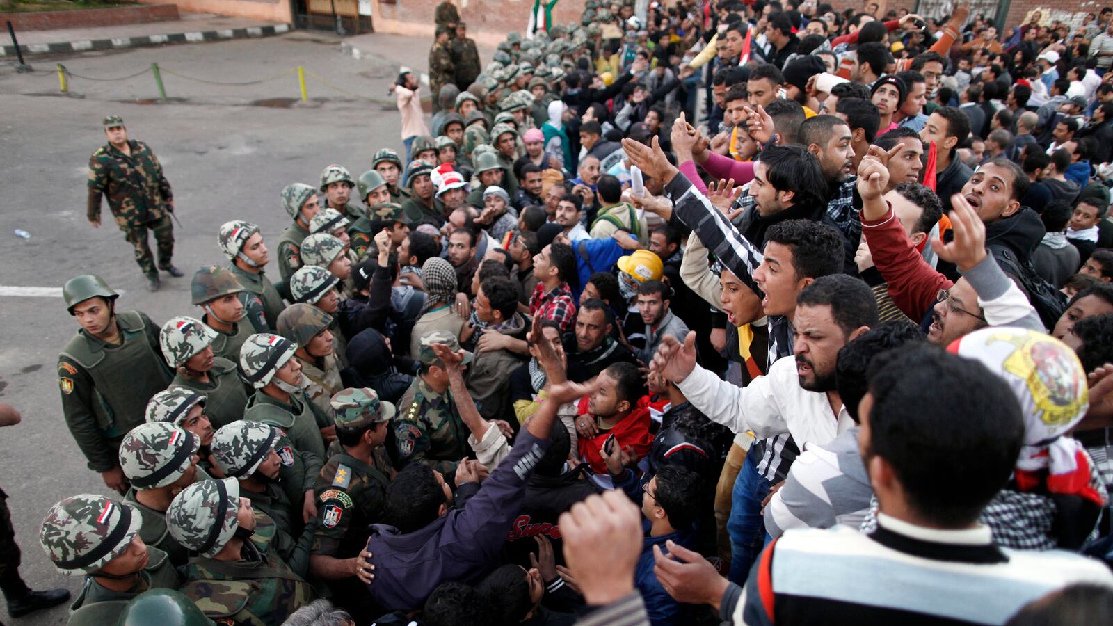 articles/2012/12/09/morsi-and-the-military-egypt-president-firm-on-constitution-vote/egypt-morsi-military-state-giglio-tease_zcgpgo