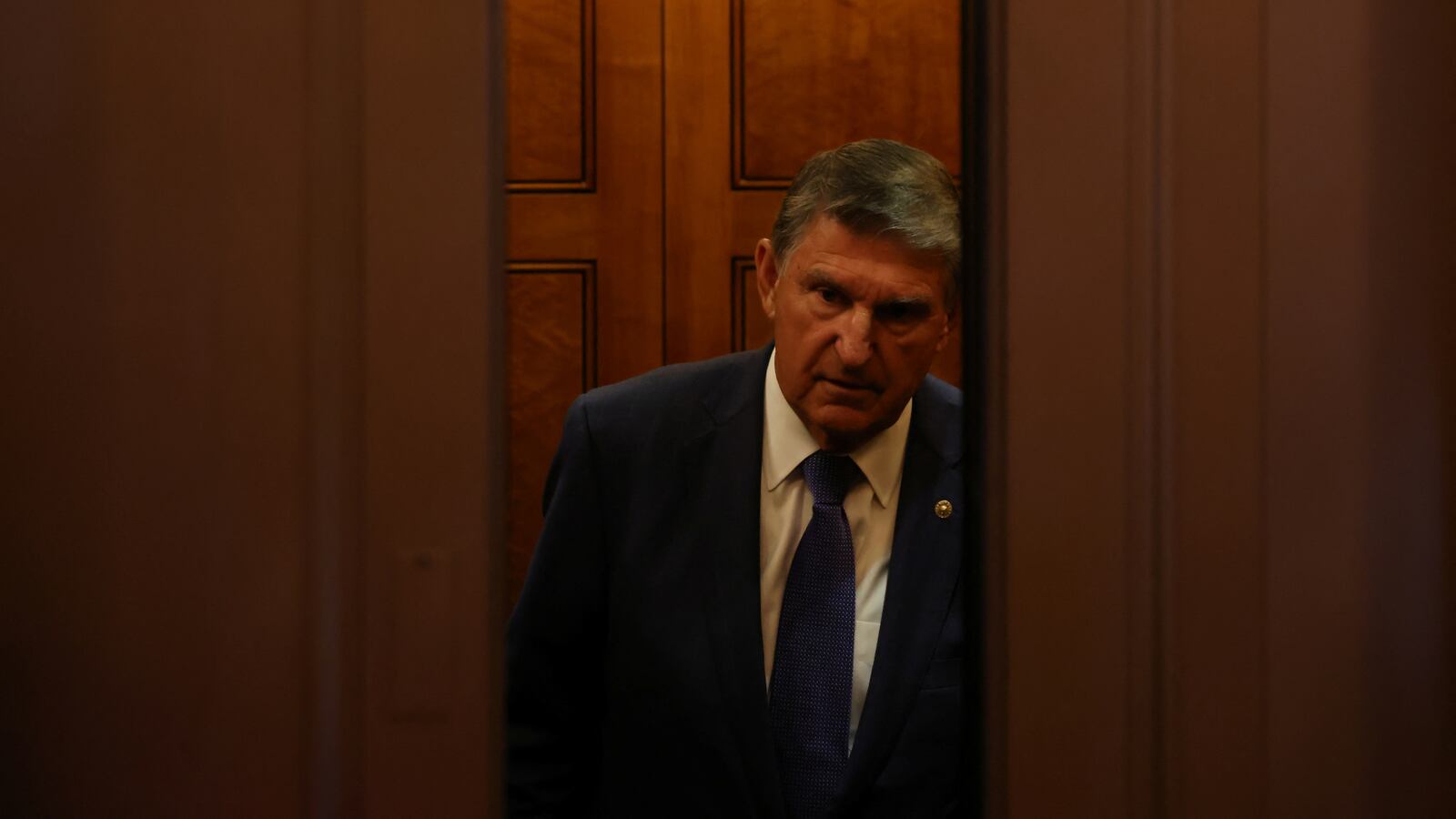 U.S. Senator Joe Manchin rides an elevator after leaving the Senate floor on September 6, 2023.