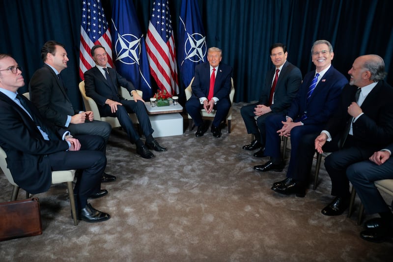 President Donald Trump (C-R) with NATO Secretary General Mark Rutte (C-L) alongside U.S. Secretary of State Marco Rubio, U.S. Treasury Secretary Scott Bessent, U.S. Secretary of Commerce Howard Lutnick, U.S. Secretary of Energy Chris Wright and U.S. Special Envoy to the Middle East Steve Witkoff on the sidelines of the World Economic Forum.