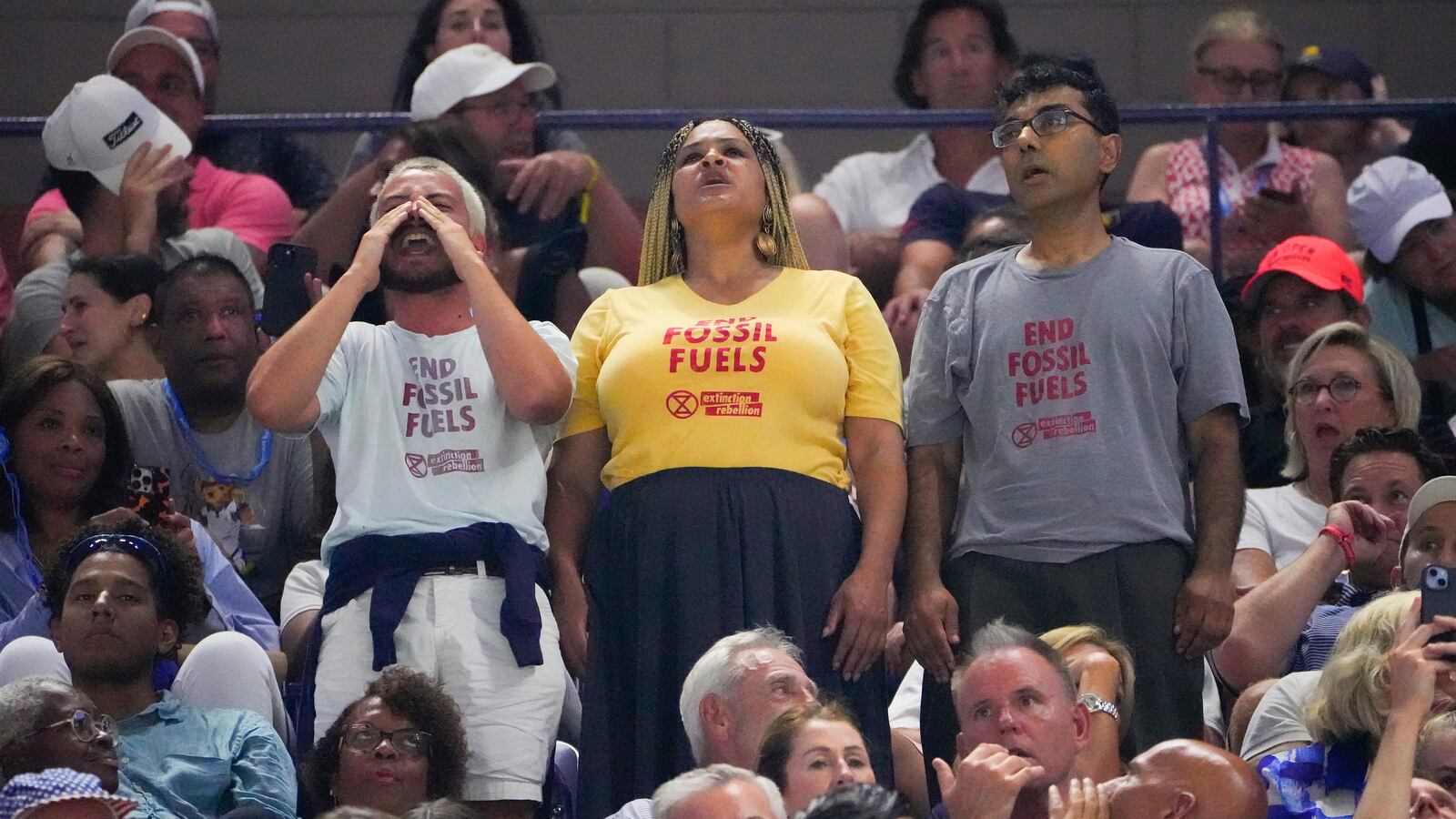 Protesters interrupt the U.S. Open semifinal between Coco Gauff and Karolina Muchova.