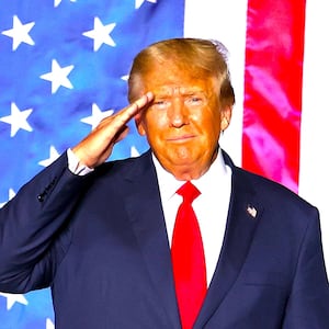 Donald Trump salutes supporters during a campaign rally at Minden-Tahoe Airport on October 08, 2022 in Minden, Nevada.