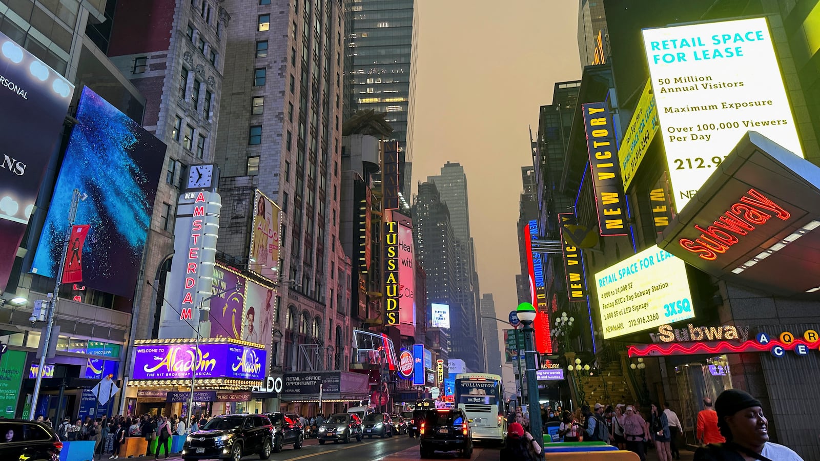 Times Square in Manhattan is shrouded in haze and smoke which drifted south from wildfires in Canada, in New York City, New York, U.S., June 6, 2023.