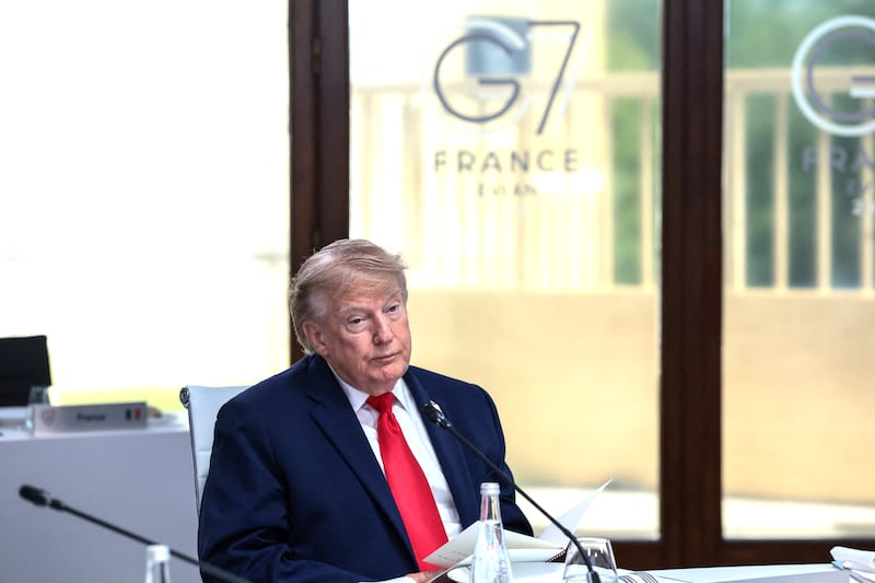U.S. President Donald Trump attends a working lunch with leaders of G7 and the Middle East, in Evian-les-Bains, France, June 16, 2026.