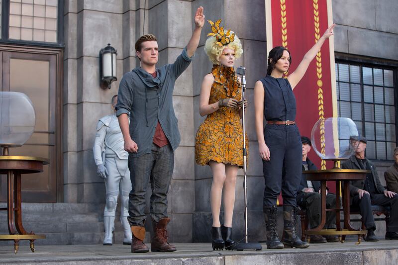 Josh Hutcherson, Elizabeth Banks, and Jennifer Lawrence in The Hunger Games: Catching Fire.