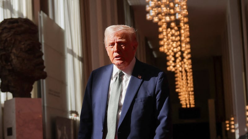 U.S. President Donald Trump speaks to the media after attending a board meeting at the Kennedy Center, in Washington, D.C., U.S., March 17, 2025. REUTERS/Carlos Barria