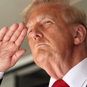 U.S. President Donald Trump salutes as he attends the FIFA Club World Cup final at the MetLife Stadium in East Rutherford, New Jersey, U.S., July 13, 2025. REUTERS/Kevin Lamarque