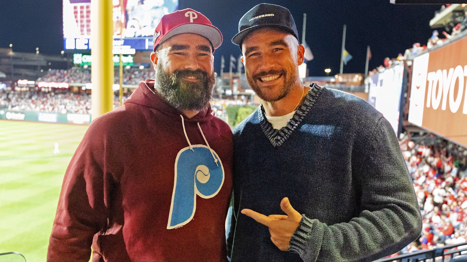 Jason and Travis Kelce pose for a photo during Game 1 of the NLCS between the Arizona Diamondbacks and the Philadelphia Phillies at Citizens Bank Park on Monday, Oct. 16, 2023 in Philadelphia, Pennsylvania.