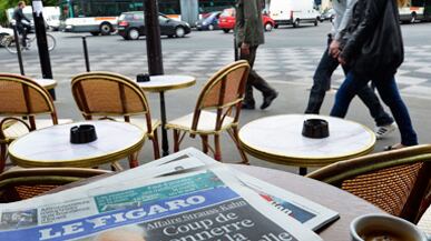 articles/2011/05/18/dominique-strauss-kahn-arrest-leaves-his-french-supporters-in-despair/sutton-dsk-paris-blues_181438_wcuegf