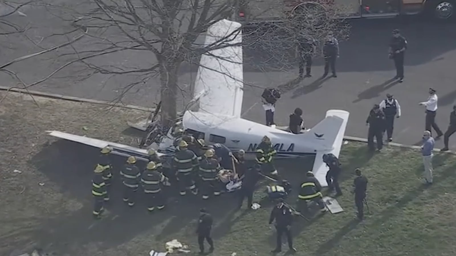 Emergency workers surrounded the crashed plane.