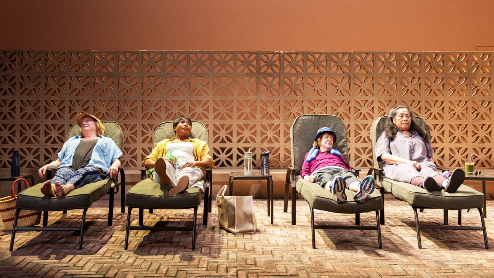 Kristine Nielsen (Ginnie), Brenda Pressley (Elaine), Marylouise Burke (Eileen), and Mia Katigbak (Yvette) in 'Infinite Life.'