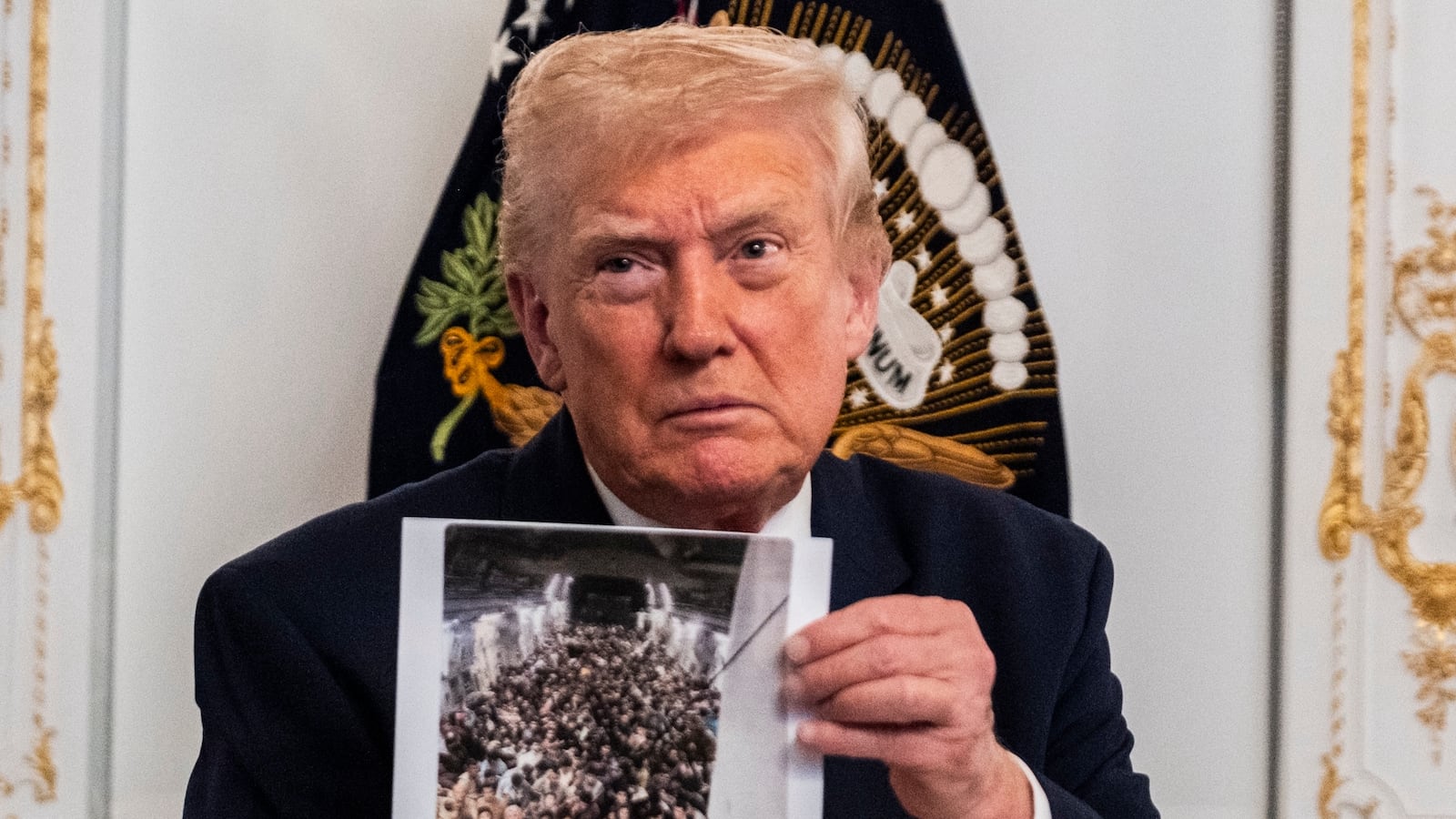 PALM BEACH, FLORIDA - NOVEMBER 27: President Donald Trump participates in a call with U.S. service members from his Mar-a-Lago club in Florida on Thanksgiving Day on November 27, 2025 in Palm Beach, Florida. (Photo by Pete Marovich/Getty Images)