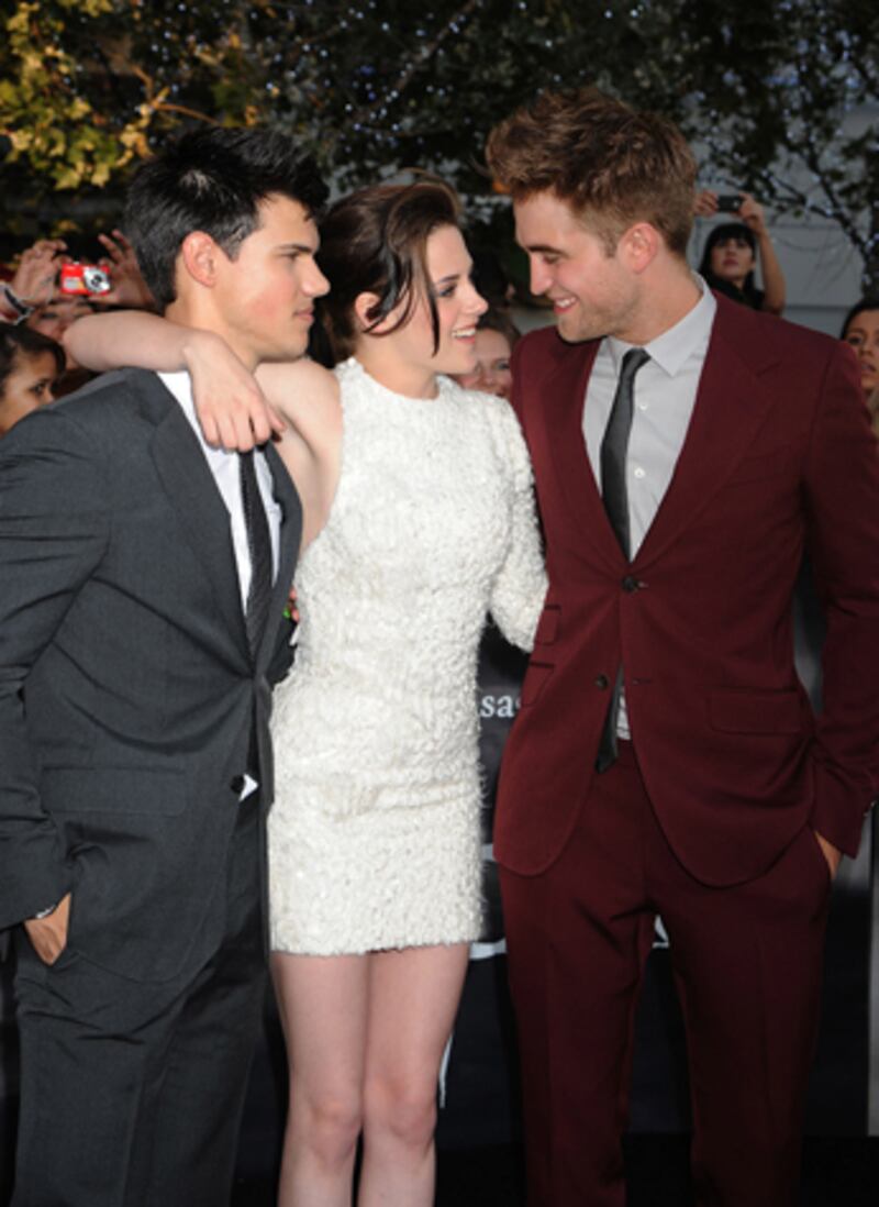 galleries/2012/08/07/prince-harry-tom-cruise-more-celebrity-third-wheels-photos/third-wheels-lautner_egscit