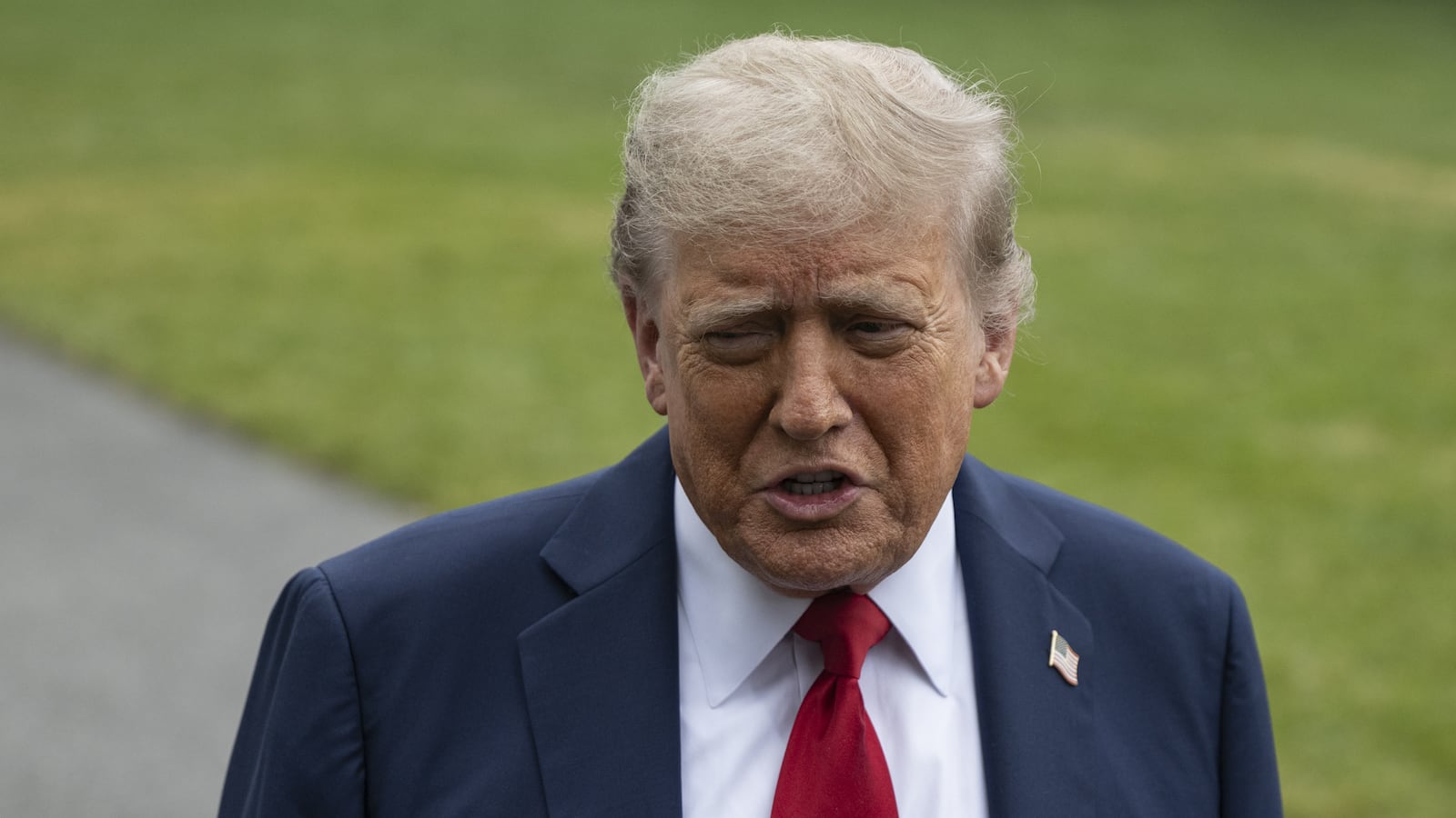 President Donald Trump speaks to the press before he departs from the White House to Calgary, Canada.