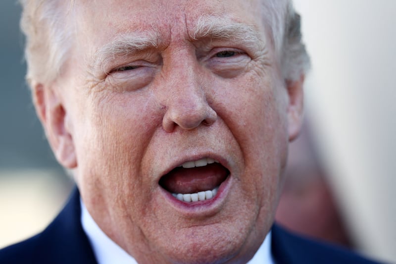 U.S. President Donald Trump speaks to the media before departing West Palm Beach aboard Air Force One, Florida, U.S., March 23, 2026.