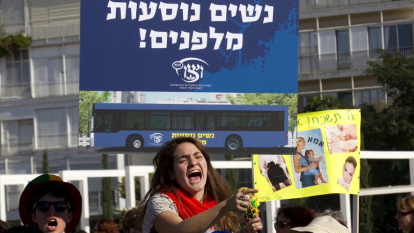 articles/2012/10/15/the-bare-fact-of-her-bodily-presence/womenprotesting-openz-jpeg_gie5km