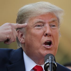 WASHINGTON, DC - OCTOBER 01: U.S. President Donald Trump calls journalists 'loco,' which is Spanish for crazy, during a press conference to discuss a revised U.S. trade agreement with Mexico and Canada in the Rose Garden of the White House on October 1, 2018 in Washington, DC. U.S. and Canadian officials announced late Sunday night that a new deal, named the 'U.S.-Mexico-Canada Agreement,' or USMCA, had been reached to replace the 24-year-old North American Free Trade Agreement.  (Photo by Chip Somodevilla/Getty Images)