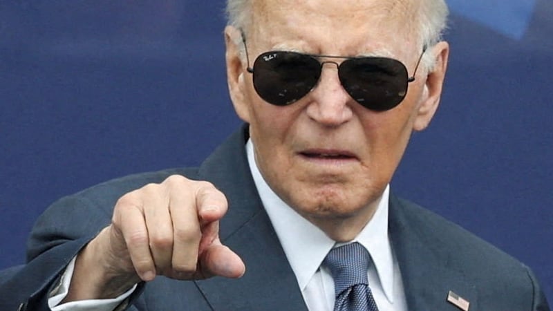Former U.S. President Joe Biden gestures during a dedication ceremony for the opening of the Obama Presidential Center, in Chicago, Illinois, U.S., June 18, 2026. REUTERS/Brendan McDermid
