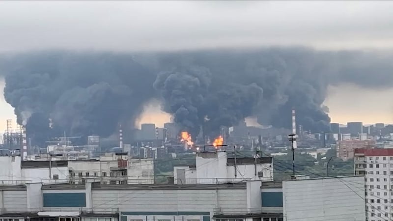 Thick plumes of smoke with flames rise from an oil refinery in Moscow, Russia,  June 18, 2026 in this screengrab taken from a social media video.