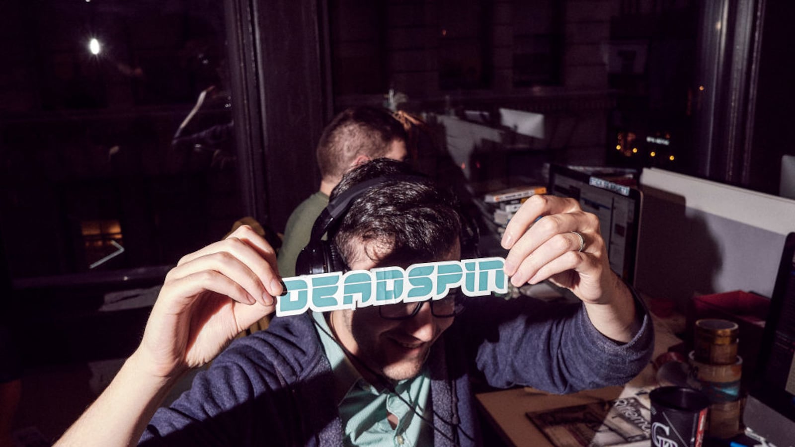 An employee of the website Deadspin shows a logo at their office in Manhattan, New York on November 1, 2018.