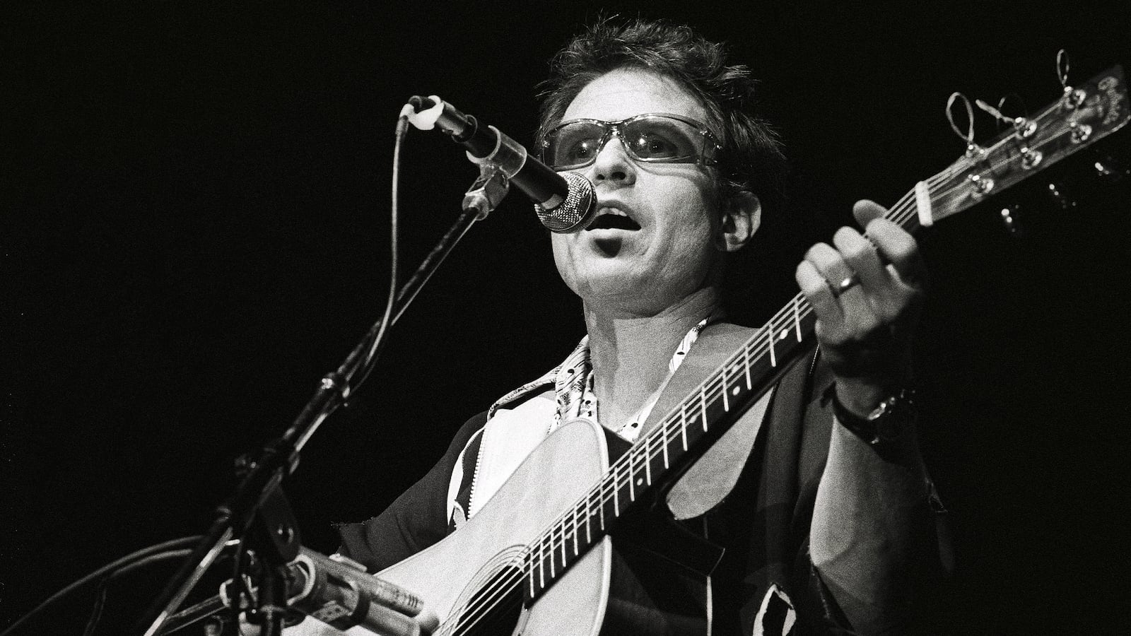 Country Joe McDonald performs on stage at Woodstock Revival Festival, Jaap Edenhal, Amsterdam, Netherlands, 27th September 1979.