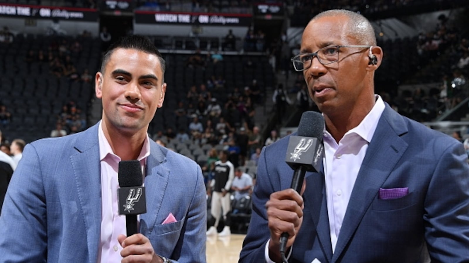SAN ANTONIO, TX - OCTOBER 9 : Jacob Tobey and Sean Elliott smiles during the game between the Utah Jazz and San Antonio Spurs at the Frost Bank Center in San Antonio, Texas on October 9, 2024. NOTE TO USER: User expressly acknowledges and agrees that, by downloading and or using this Photograph, user is consenting to the terms and conditions of the Getty Images License Agreement. Mandatory Copyright Notice: Copyright 2024 NBAE (Photo by Michael Gonzales/NBAE via Getty Images)