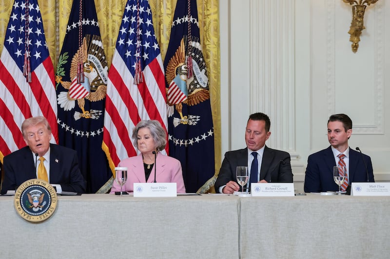 U.S. President Donald Trump, White House chief of staff Susie Wiles, outgoing President of the Kennedy Center Richard Grenell and Vice President of facilities operations at the Kennedy Center Matt Floca, who is set to become the new President of the Kennedy Center.