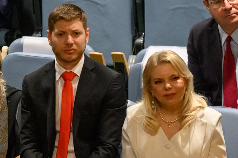 Yair Netanyahu (L) and Sara Netanyahu listen to Israeli Prime Minister Benjamin Netanyahu speech at The 80th session of The United Nations General Assembly (UNGA) on September 26, 2025 in New York City.