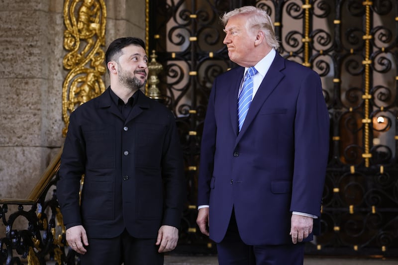 U.S. President Donald Trump greets Ukrainian President Volodymyr Zelensky at his Mar-a-Lago club on December 28, 2025 in Palm Beach, Florida. Trump invited Zelensky to his private club to work on the U.S.-proposed peace plan to end the war in Ukraine, as the conflict approaches four years since the sudden full-scale invasion by Russia on February 24, 2022.