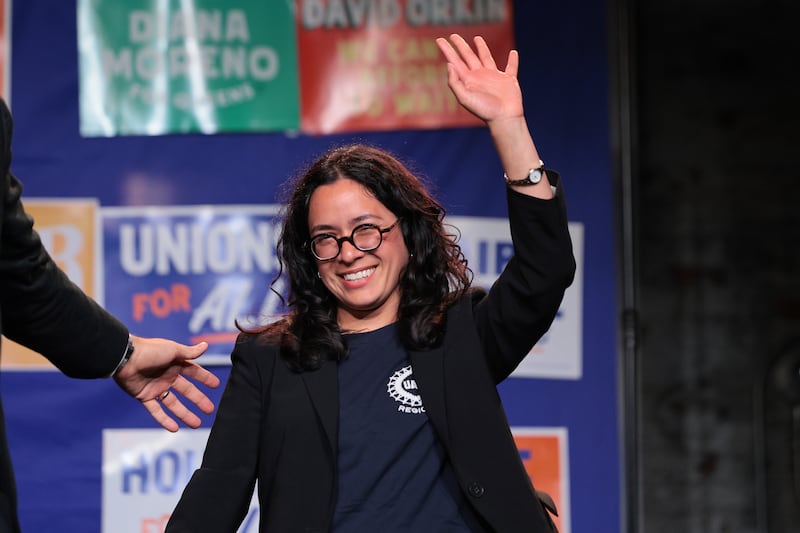Congressional candidate Claire Valdez takes the stage after her primary win in her East Williamsburg, New York neighborhood.