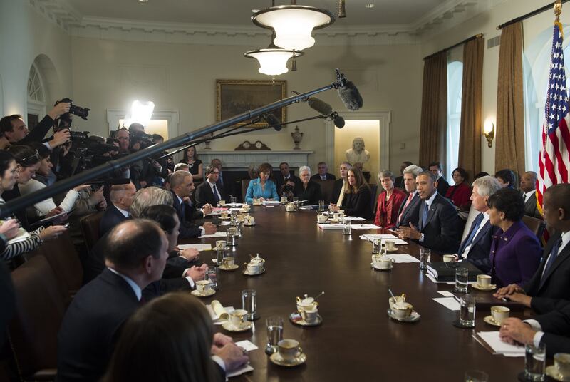 Former President Barack Obama addresses his cabinet in 2015.
