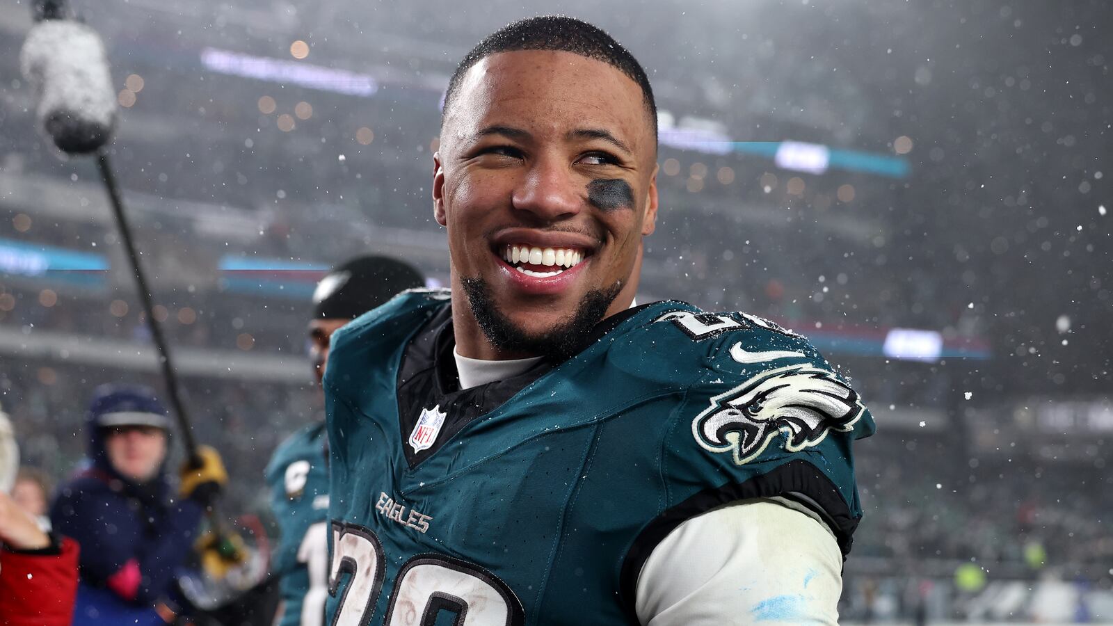 Saquon Barkley #26 of the Philadelphia Eagles reacts after defeating the Los Angeles Rams 28-22 in the NFC Divisional Playoff at Lincoln Financial Field on January 19, 2025 in Philadelphia, Pennsylvania.