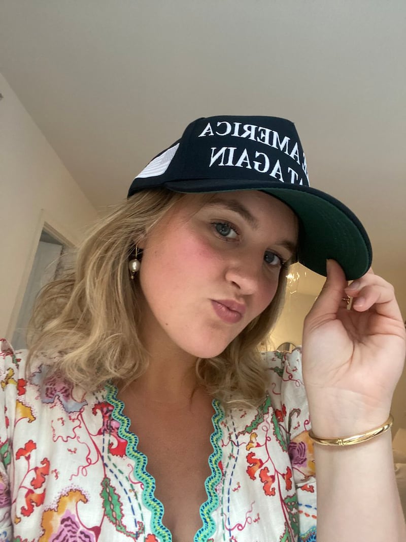 Woman wearing maga hat