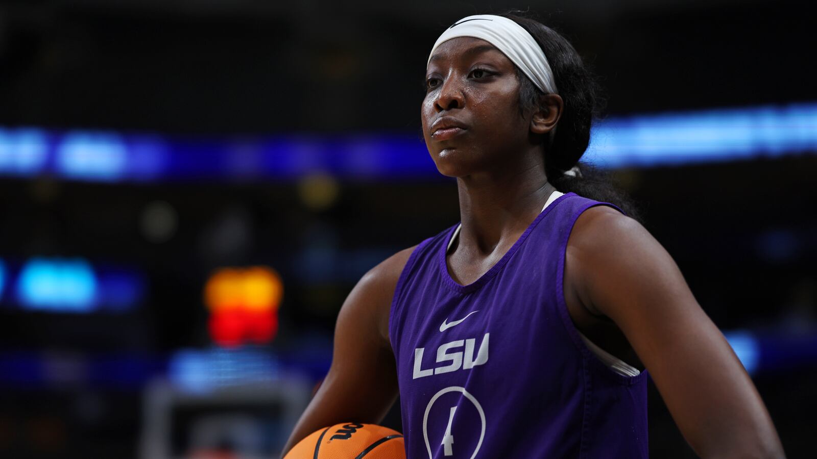 Flau'jae Johnson #4 of the LSU Lady Tigers looks on during practice before the 2023 NCAA Women's Final Four semifinal game at American Airlines Center on March 30, 2023 in Dallas, Texas.
