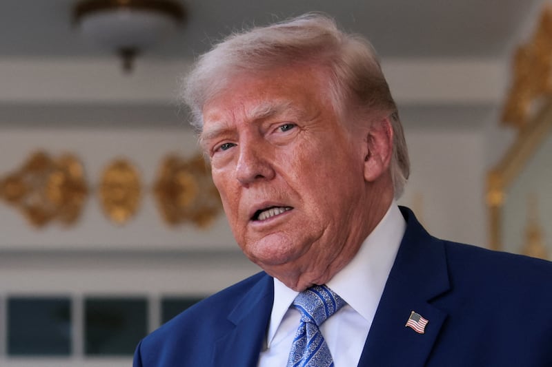 U.S. President Donald Trump looks on while hosting a reception for the reigning Major League Baseball (MLB) World Series champion Los Angeles Dodgers in the Rose Garden at the White House, Washington, D.C., U.S., July 23, 2026. REUTERS/Evelyn Hockstein