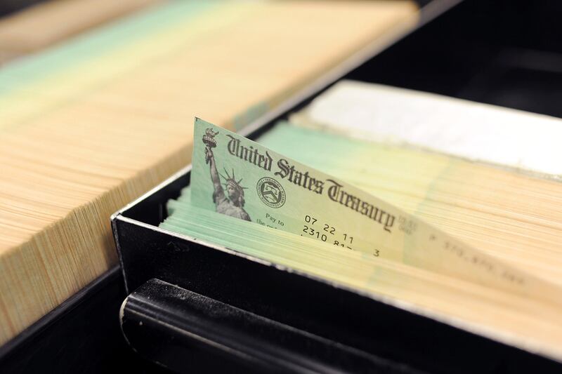 articles/2011/07/27/no-debt-deal-means-hard-choices-to-balance-america-s-finances/america-checkbook-stone_bddzx9