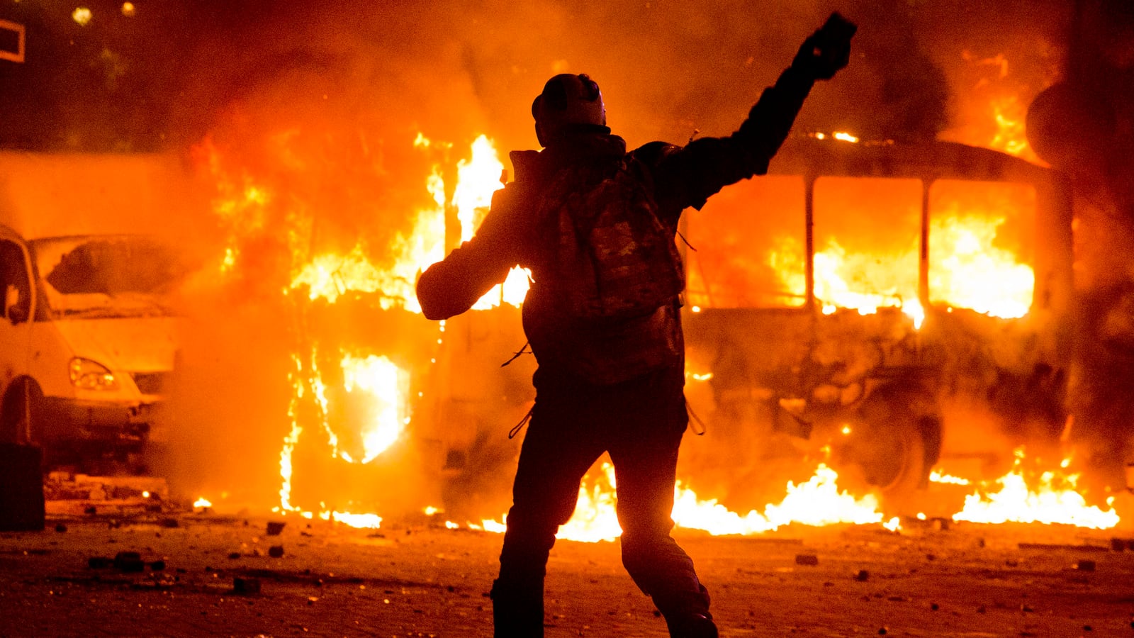 articles/2014/01/19/ukraine-mobs-set-policemen-on-fire/140119-nemstova-ukraine-tease_v3ta3j