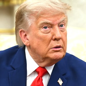 US President Donald Trump listens to questions from the press as he meets with Lebanese President Joseph Aoun in the Oval Office of the White House in Washington, DC, on July 21, 2026.