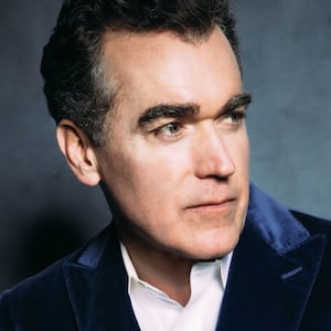A close-up portrait of Brian d’Arcy James