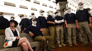 Members of the white supremacist group Patriot Front wait to board a train at Eastern Market metro station on July 04, 2026 in Washington, DC. Numerous events, activities, and fireworks are planned in celebration of America's 250th Anniversary.