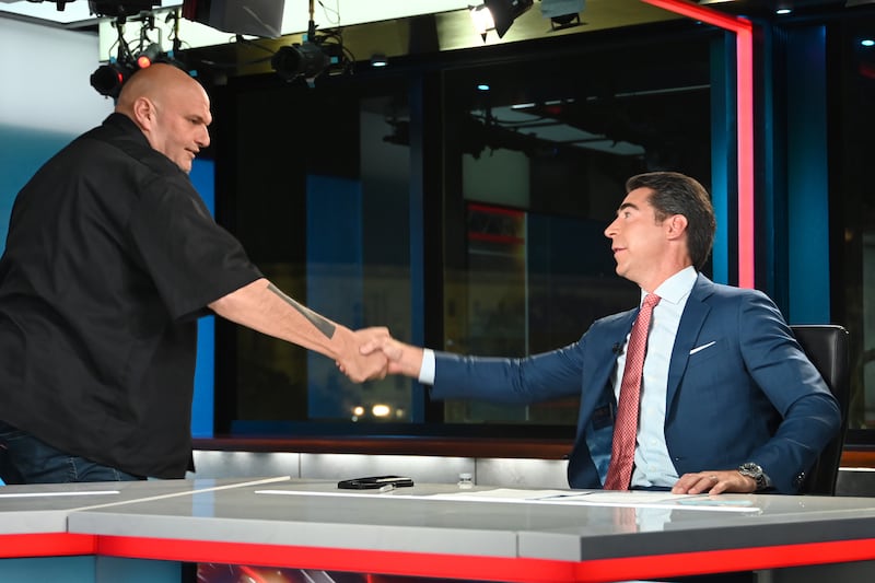 Sen. John Fetterman appears with host Jesse Watters on "Jesse Watters Primetime" at FOX News D.C. Bureau in 2025.