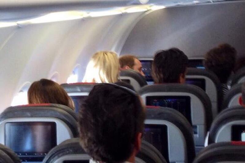 articles/2014/05/06/prince-william-flies-home-in-coach/WILLIAM-COACH_at8hk8