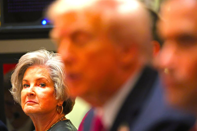 White House Chief of Staff Susie Wiles (L) looks on as US President Donald Trump (C) meets with unseen Ukrainian President Volodymyr Zelensky